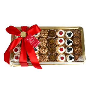 Charola surtida con tartas y mostachones.     ( 32 pz. )